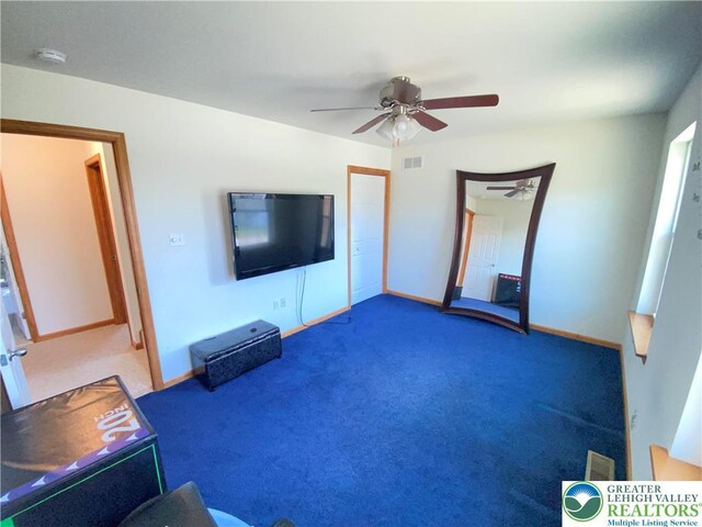 178 Stoney Ledge Dr, Jackson Twp, PA 18360 - unfurnished living room featuring carpet floors, a ceiling fan, baseboards, and visible vents