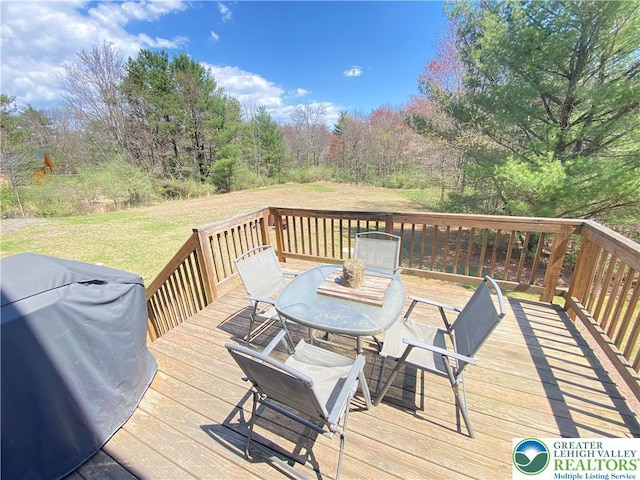 178 Stoney Ledge Dr, Jackson Twp, PA 18360 - wooden terrace with area for grilling, a lawn, and outdoor dining area