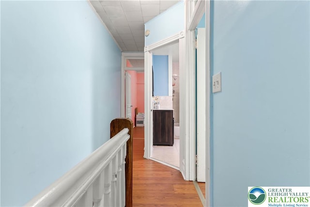 hall featuring light wood-style flooring