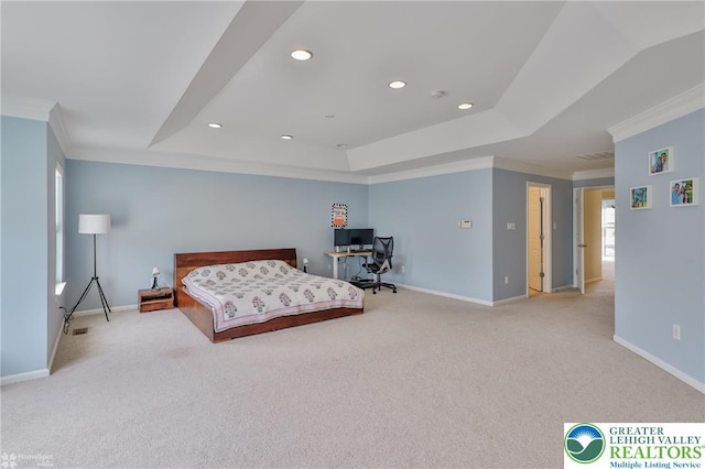 carpeted bedroom with a tray ceiling, baseboards, ornamental molding, and recessed lighting