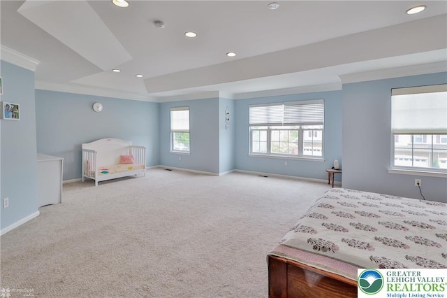 carpeted bedroom featuring baseboards and recessed lighting