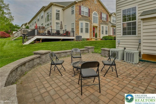 view of patio / terrace featuring a deck and cooling unit