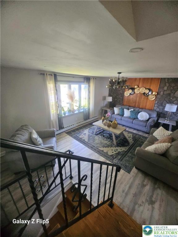 living area featuring wood finished floors