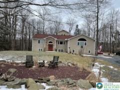 view of front of property with an outdoor fire pit