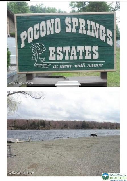 community sign with a water view