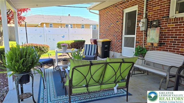 view of patio / terrace with fence