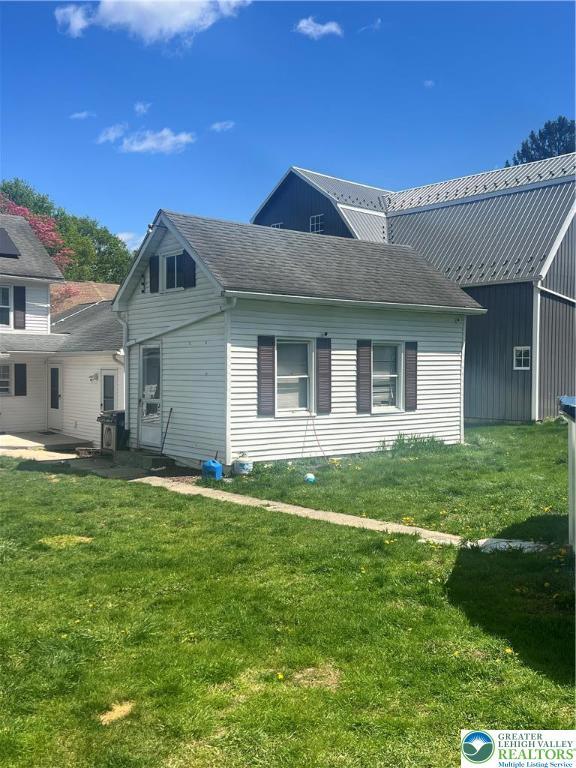 8204 Brown St, Washington Twp, PA 18079 - view of property exterior with a lawn