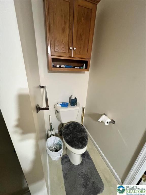 8204 Brown St, Washington Twp, PA 18079 - bathroom featuring baseboards and toilet