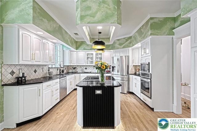 1231 Oakside Dr, Hanover Twp, PA 18017 - kitchen with a sink, appliances with stainless steel finishes, crown molding, and white cabinetry