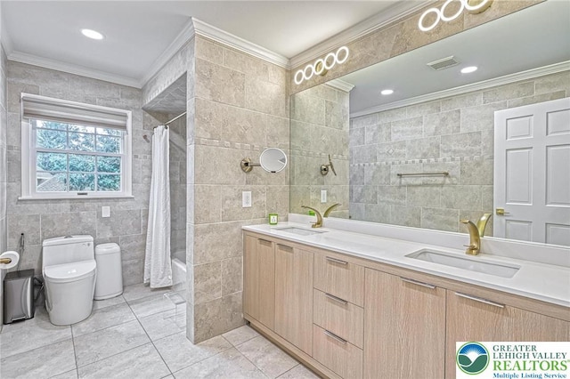1231 Oakside Dr, Hanover Twp, PA 18017 - bathroom featuring visible vents, ornamental molding, toilet, tile walls, and a sink