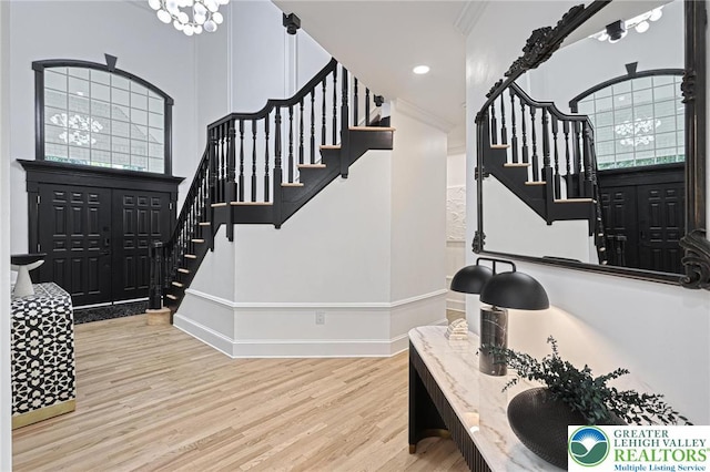 1231 Oakside Dr, Hanover Twp, PA 18017 - foyer entrance featuring crown molding, recessed lighting, baseboards, wood finished floors, and stairway