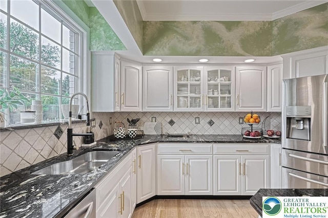 1231 Oakside Dr, Hanover Twp, PA 18017 - kitchen featuring a sink, white cabinetry, a healthy amount of sunlight, and stainless steel fridge with ice dispenser