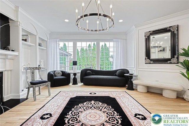 1231 Oakside Dr, Hanover Twp, PA 18017 - living area featuring a fireplace with flush hearth, an inviting chandelier, ornamental molding, and wood finished floors