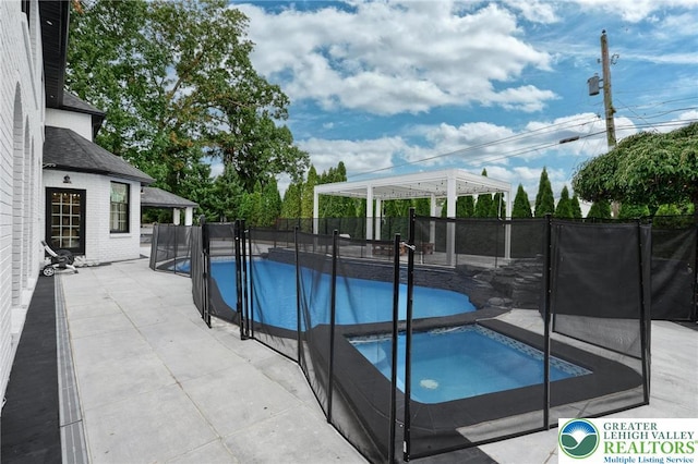 1231 Oakside Dr, Hanover Twp, PA 18017 - view of pool featuring an in ground hot tub, a fenced in pool, a fenced backyard, and a patio area