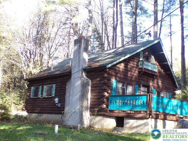 view of home's exterior with log exterior
