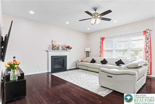 living room with recessed lighting, a glass covered fireplace, ceiling fan, and wood finished floors