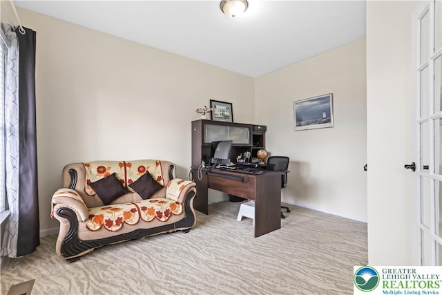 view of carpeted office space