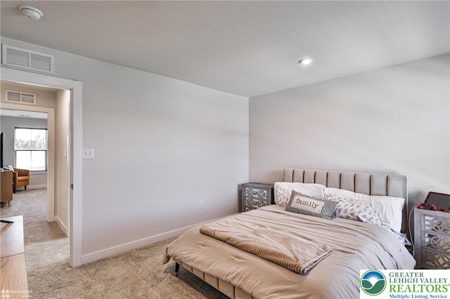 carpeted bedroom with recessed lighting, baseboards, and visible vents