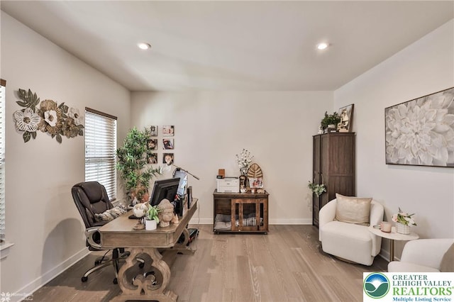 office featuring baseboards, recessed lighting, and wood finished floors