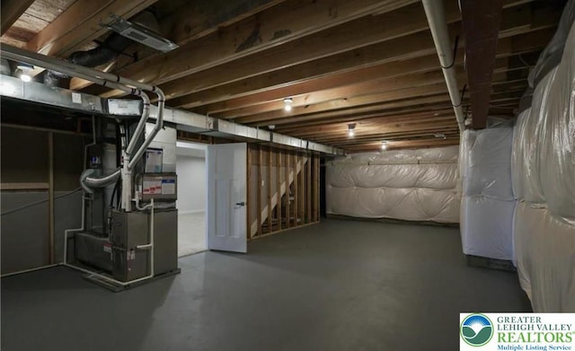 3911 Dewalt St, Bethlehem Twp, PA 18020 - unfinished below grade area featuring stairs and heating unit