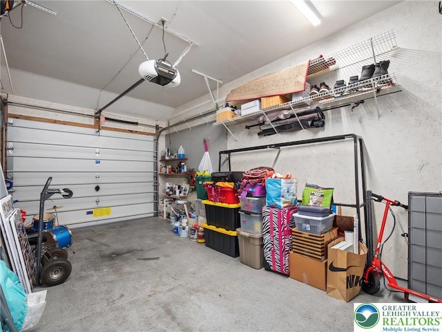 garage featuring a garage door opener