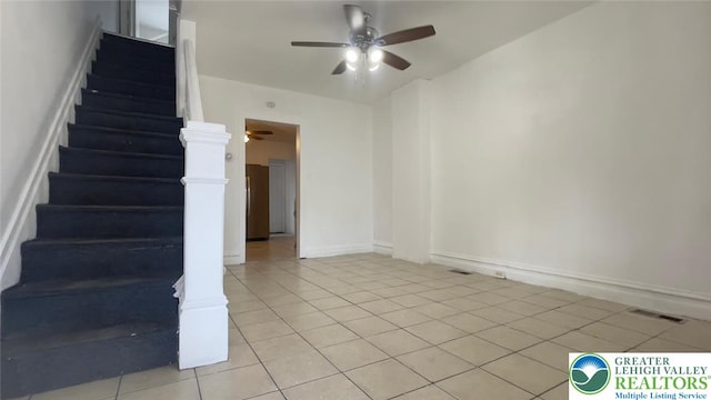 1541 W Tilghman St, Allentown City, PA 18102 - stairway with baseboards, ceiling fan, visible vents, and tile patterned floors