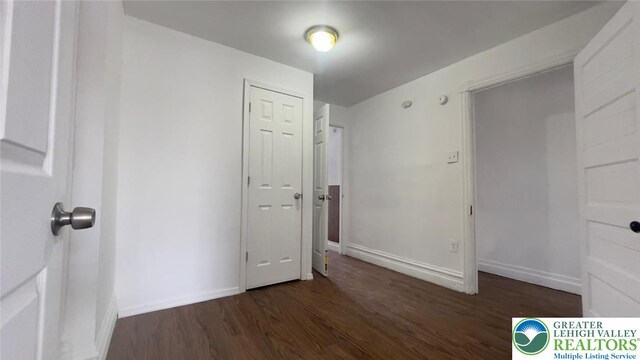 1541 W Tilghman St, Allentown City, PA 18102 - unfurnished bedroom with baseboards and wood finished floors