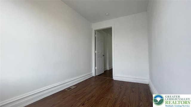 1541 W Tilghman St, Allentown City, PA 18102 - empty room featuring baseboards, dark wood finished floors, and visible vents