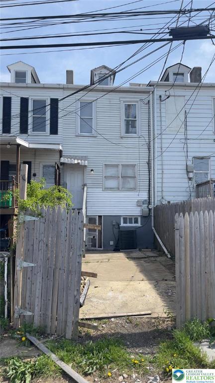 1541 W Tilghman St, Allentown City, PA 18102 - back of house with fence and central AC unit