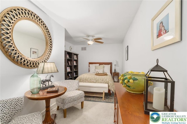 bedroom featuring ceiling fan and visible vents