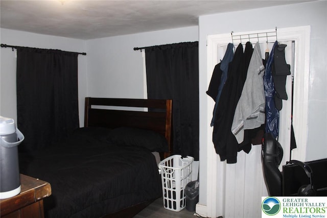 bedroom featuring wood finished floors