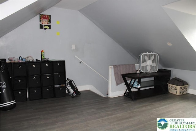 bonus room with baseboards, wood finished floors, and lofted ceiling