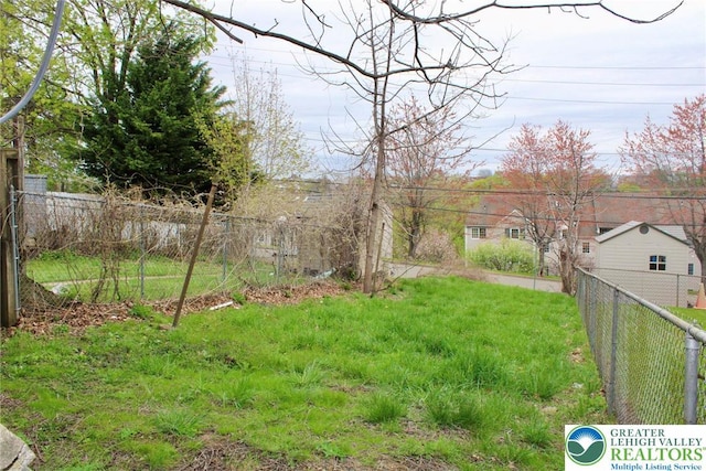 view of yard with fence