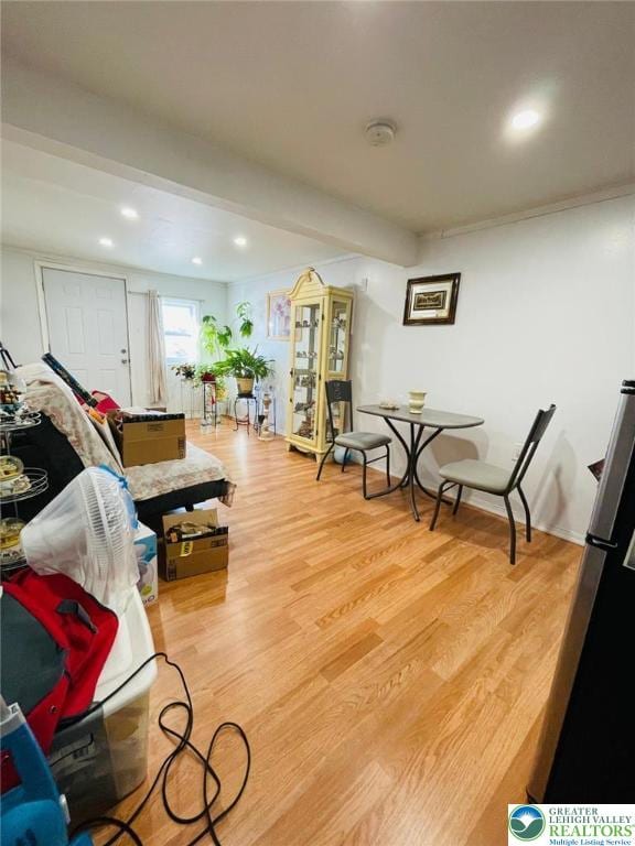 playroom with light wood-type flooring and recessed lighting