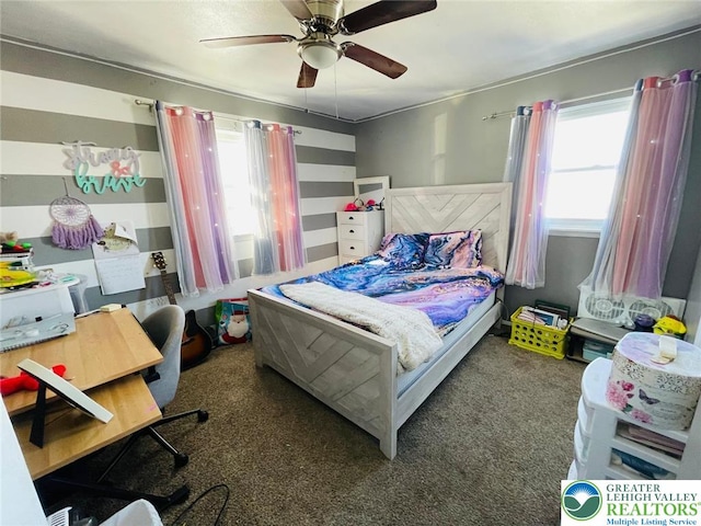carpeted bedroom with ceiling fan