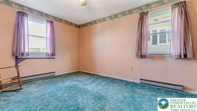 unfurnished room with carpet floors, baseboards, baseboard heating, and a baseboard heating unit