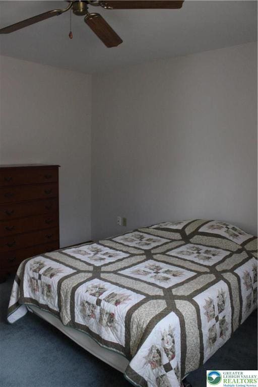 95 Piney Woods Dr, Penn Forest Township, PA 18229 - bedroom with carpet flooring and ceiling fan