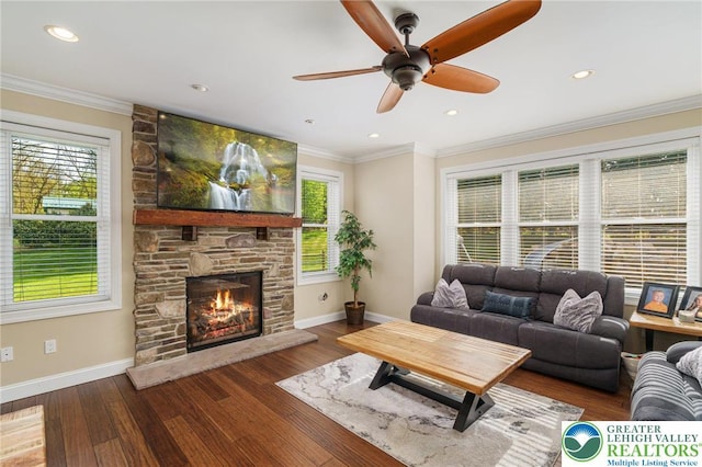 4164 Tank Farm Rd, Upper Milford Twp, PA 18049 - living area with baseboards, ornamental molding, a ceiling fan, and a stone fireplace