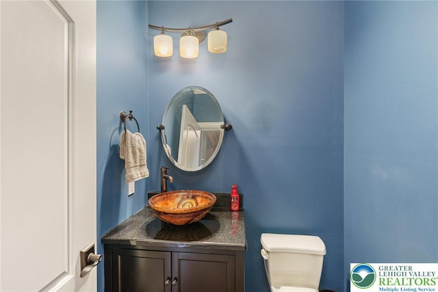4164 Tank Farm Rd, Upper Milford Twp, PA 18049 - bathroom with vanity and toilet
