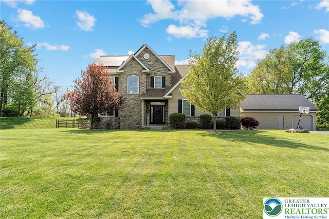 4164 Tank Farm Rd, Upper Milford Twp, PA 18049 - traditional-style home with a front yard and stone siding
