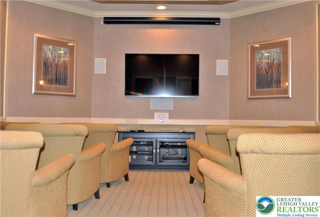 cinema featuring crown molding, carpet flooring, and recessed lighting