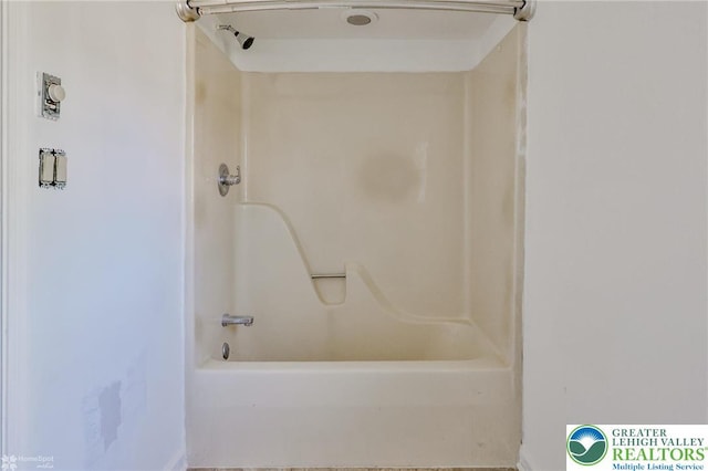 full bath featuring shower / tub combination