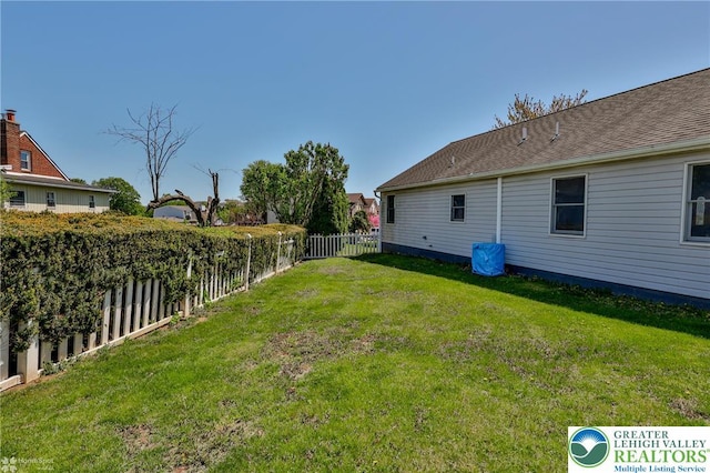 view of yard featuring a fenced backyard