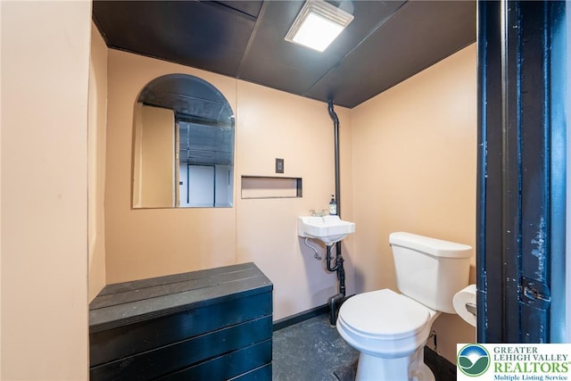 3040 Keystone St, Bethlehem Twp, PA 18020 - half bathroom with baseboards and toilet