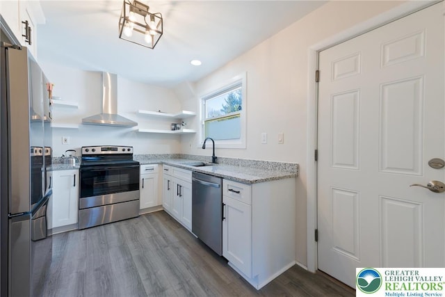 3040 Keystone St, Bethlehem Twp, PA 18020 - kitchen with open shelves, wood finished floors, a sink, stainless steel appliances, and wall chimney exhaust hood