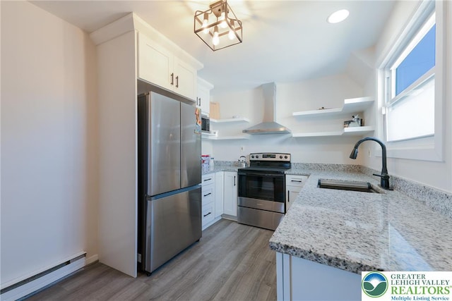 3040 Keystone St, Bethlehem Twp, PA 18020 - kitchen with open shelves, a sink, wall chimney exhaust hood, stainless steel appliances, and a baseboard heating unit