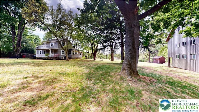 view of yard with a deck