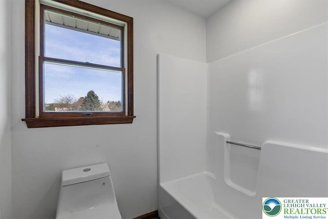 bathroom featuring toilet