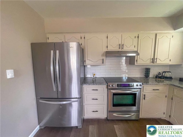 1231 Fairmount St, Bethlehem City, PA 18017 - kitchen with appliances with stainless steel finishes, tasteful backsplash, under cabinet range hood, and dark wood-style floors