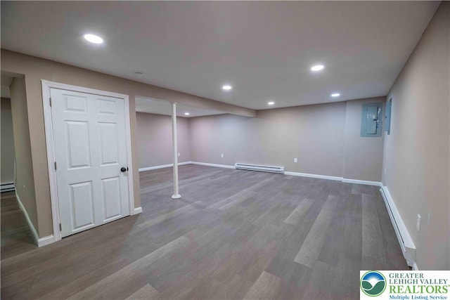 1231 Fairmount St, Bethlehem City, PA 18017 - finished below grade area featuring baseboards, a baseboard heating unit, recessed lighting, and wood finished floors